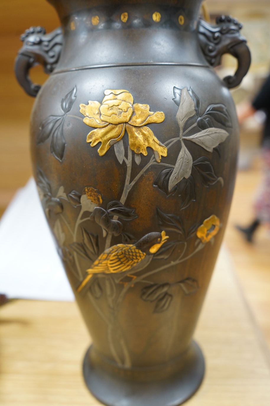 A Japanese bronze and precious metal overlaid vase, Meiji period fitted as a table lamp, 35.5cm high. Condition - drilled for cable, grubby otherwise good.